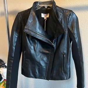 Buttery soft Chelsea 28 leather jacket with stretch arms for that perfect fit!